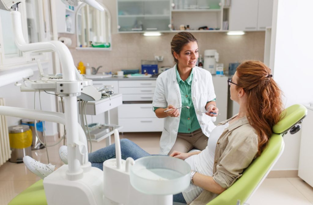 Dentist explaining the cost of treatment to a patient