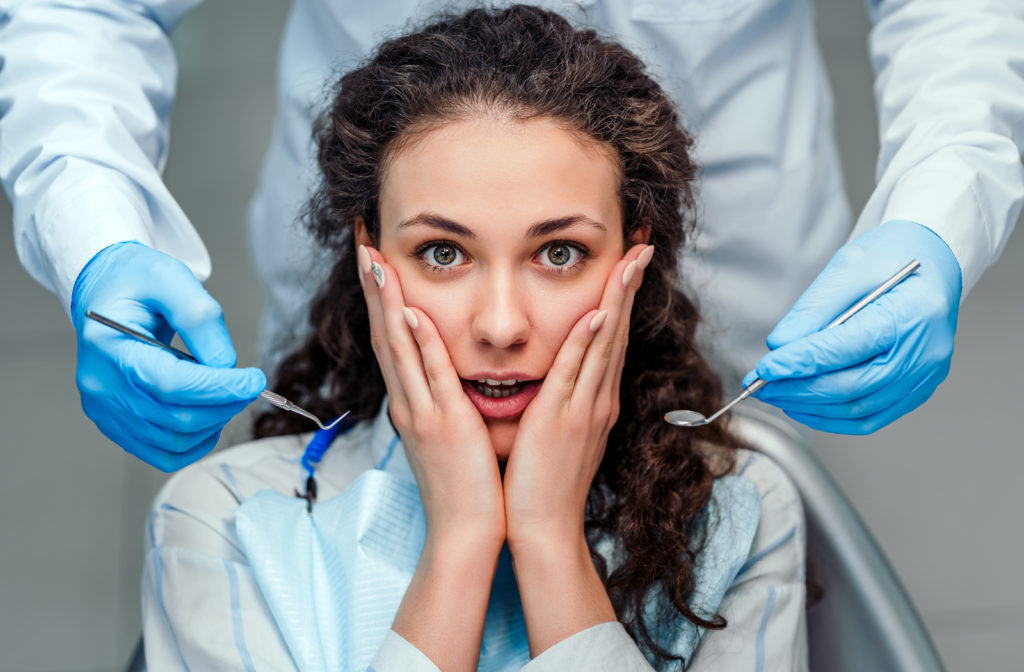 Close up of women with dental anxiety at dentists office